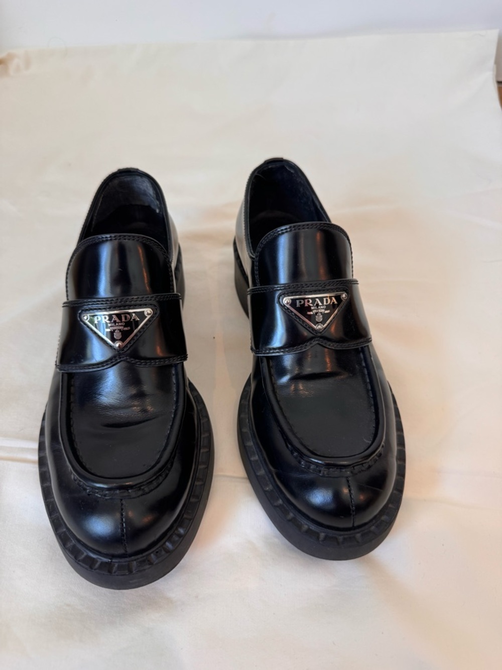Prada Black Patent Leather Slip-On Loafers with Triangle Logo - women’s 37.5